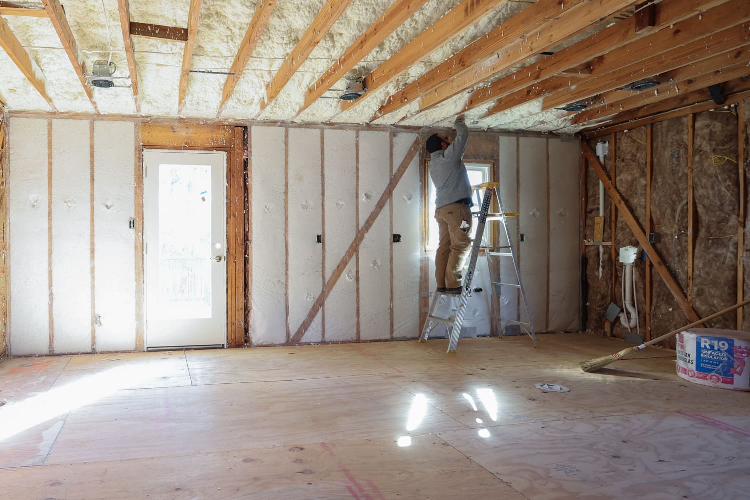 Loose Fill Fiber Glass BABS and Spray Foam in a Residential Project, Aksel Working